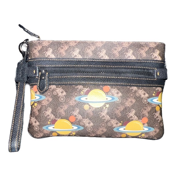 Coach Handbags - Coach Planets 🪐 Large Front Zip Wristlet With Horse And Carriage Print